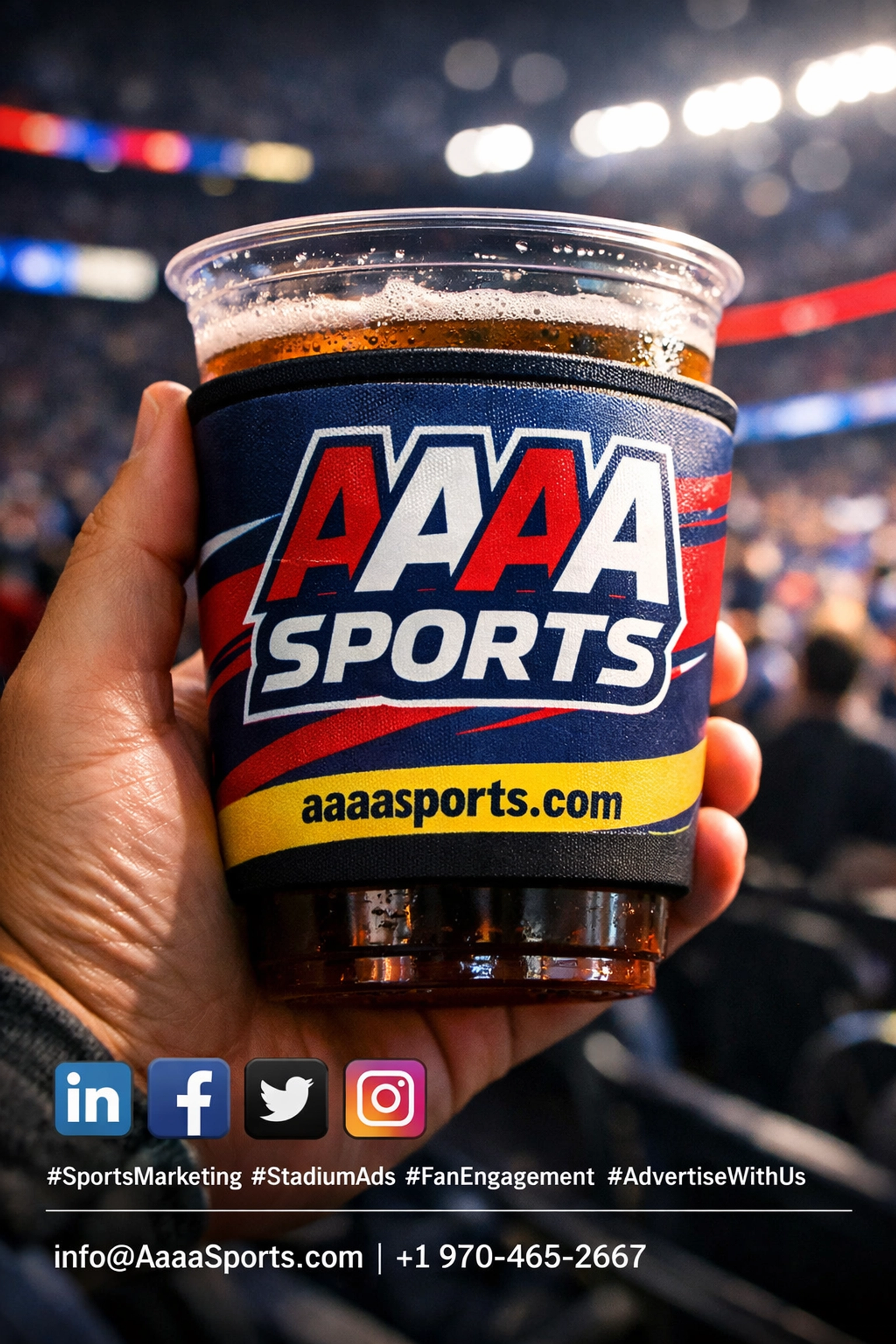 Branded stadium cupholder in fan's hand showing in-venue advertising opportunity at sporting event