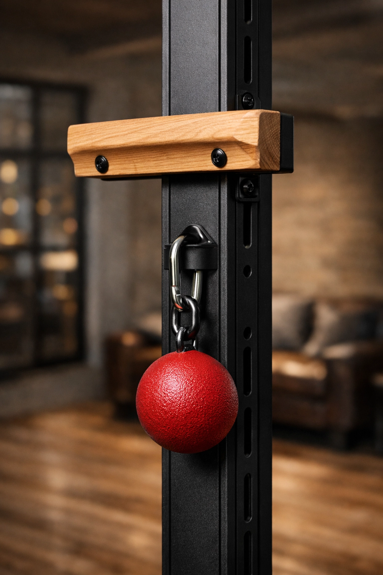 Floor to ceiling gym rail with ninja warrior cannonball and cliffhanger grip attachments.