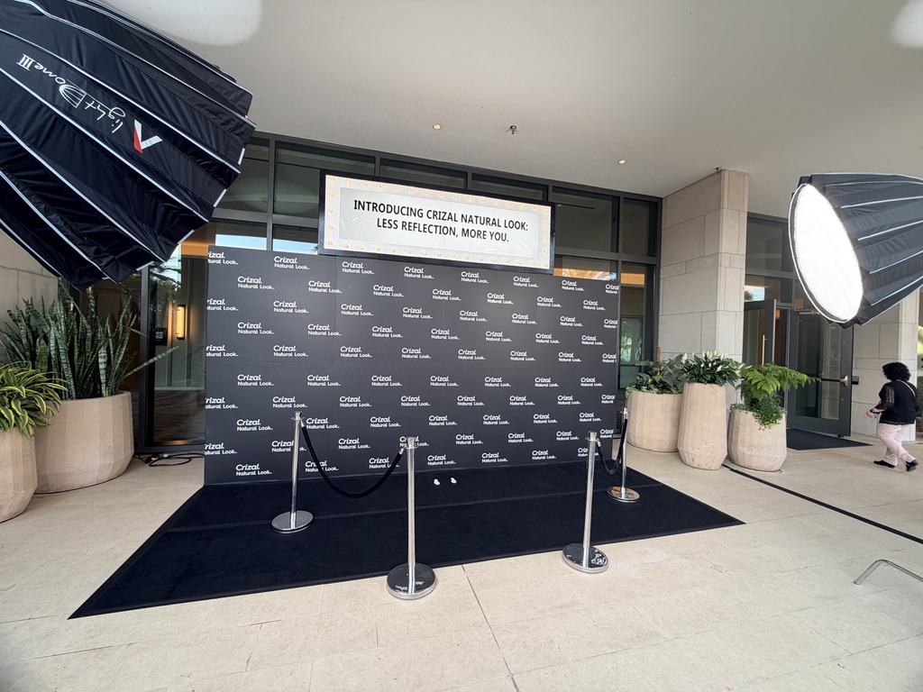 Studio Z handheld cinema rig (Canon R6 on DJI gimbal with Tilta ring grip) weaving through paparazzi — the hustle of getting the shot.