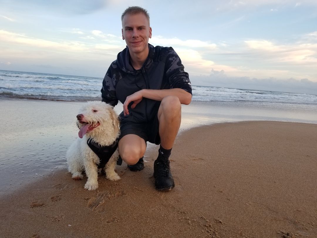 Barney and Koebi on the beach at sunset, part of the Barefoot Philosophy beach crew.