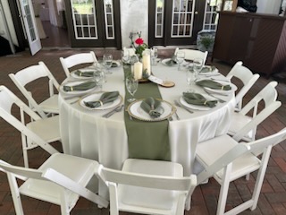 Rustic-yet-refined indoor space at The Sugarhouse featuring French doors, warm light, and elegant table styling.