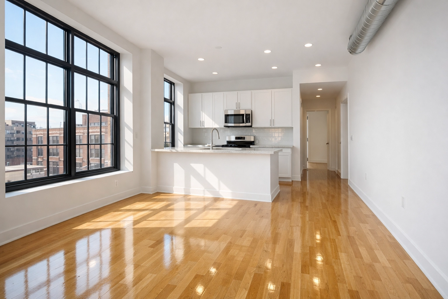 Pristine move-in ready Detroit apartment with clean hardwood floors after a professional turnover cleaning.