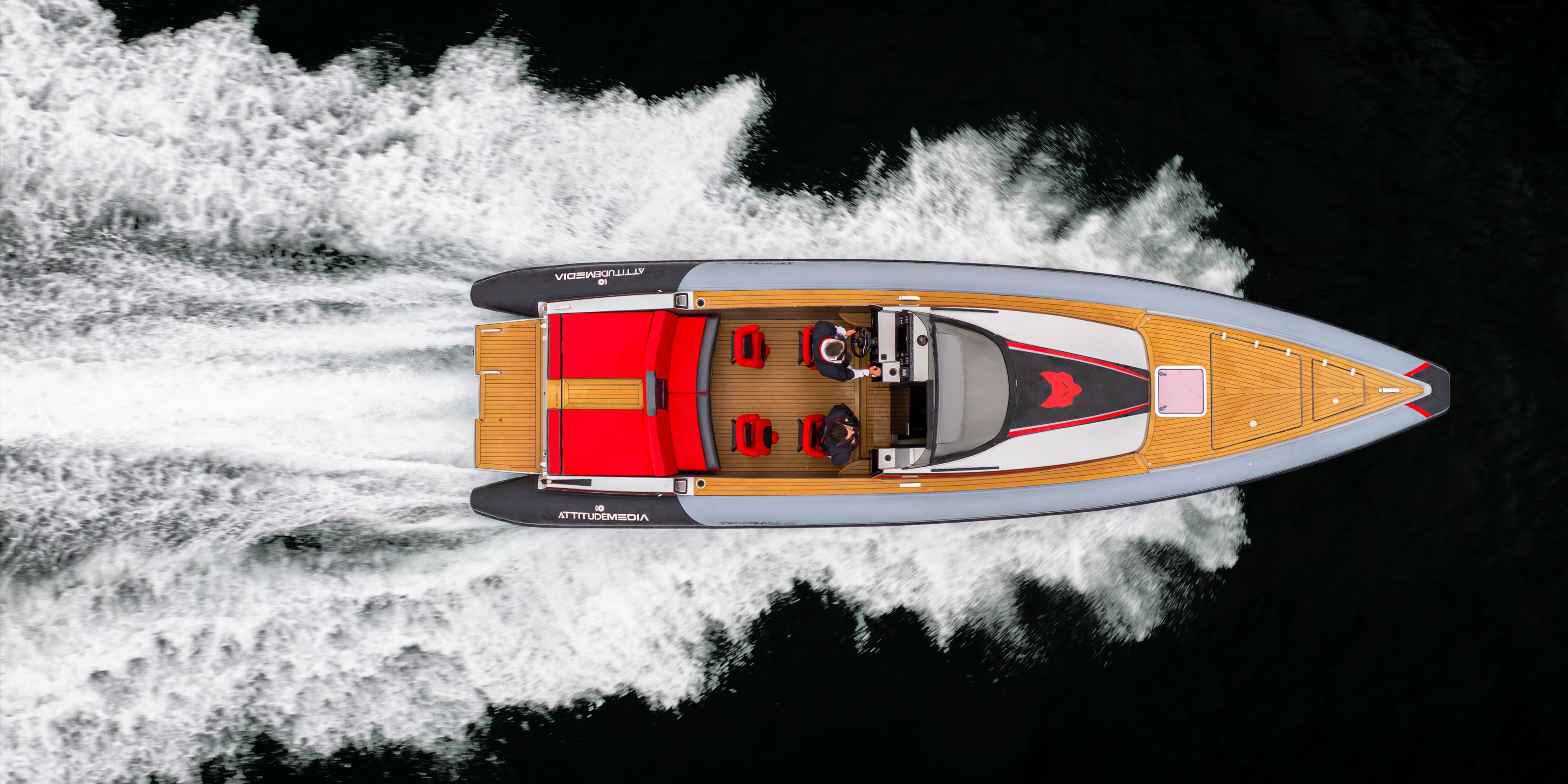 Business professionals enjoying corporate entertaining on luxury Solent powerboat charter