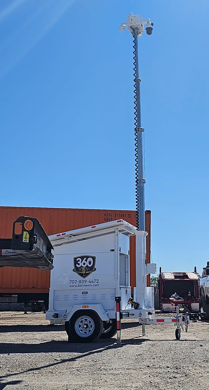 Solar-powered mobile surveillance trailer