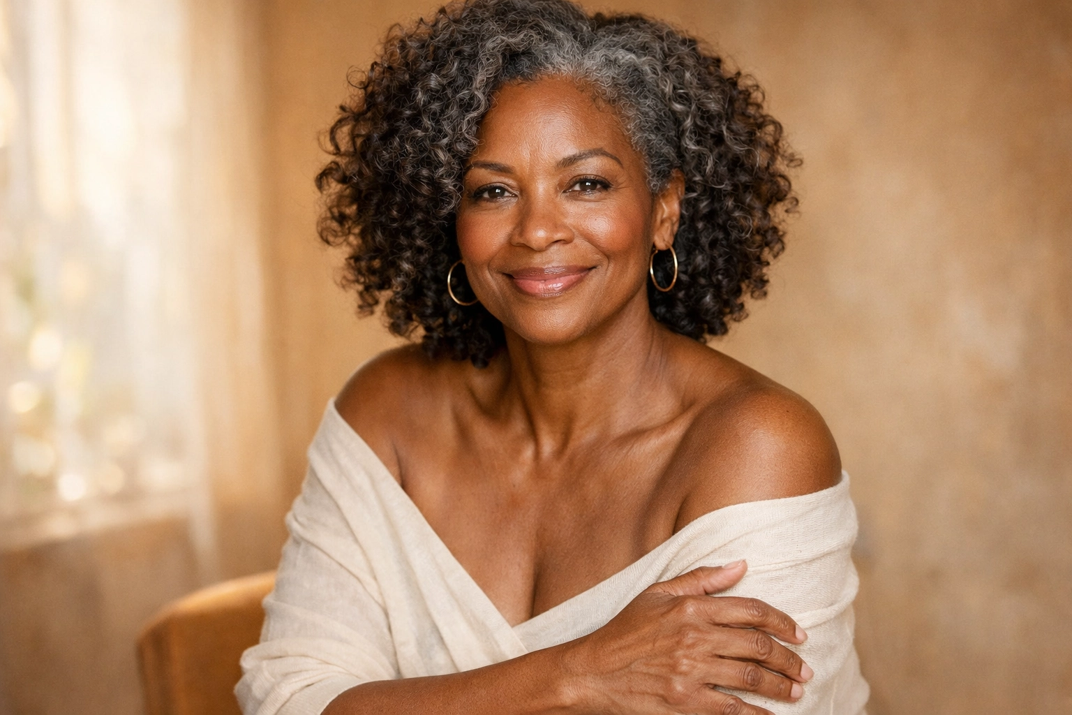 A radiant woman with healthy, glowing skin showcasing the results of consistent pro-aging skincare.