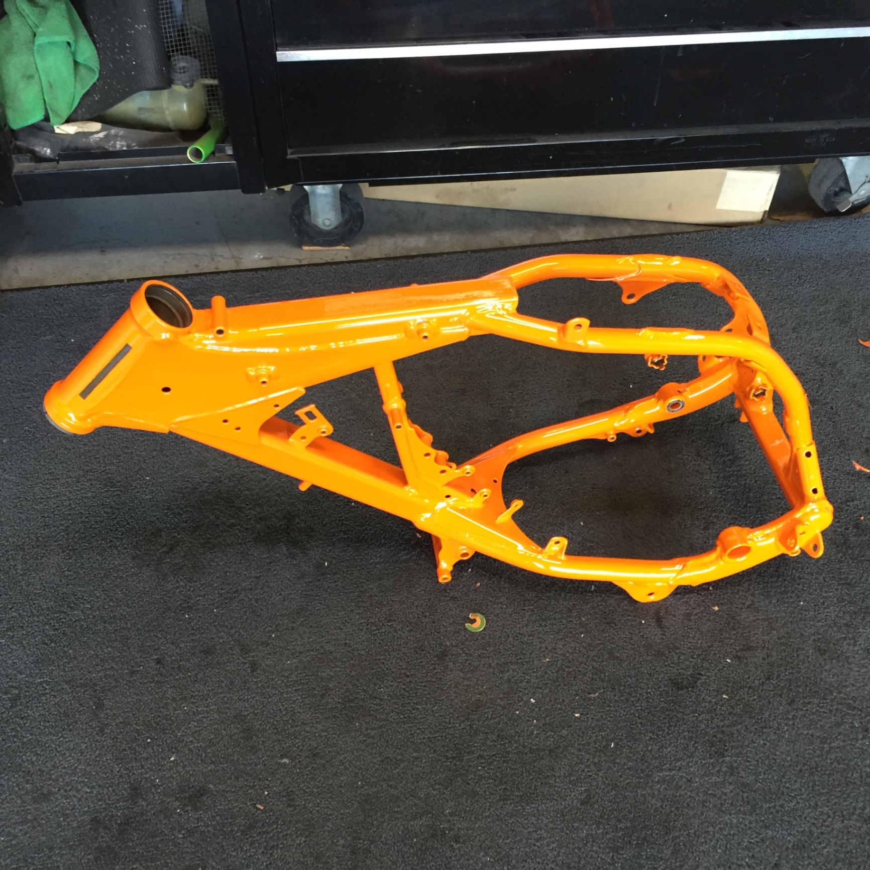 Bright orange powder coated motorcycle frame