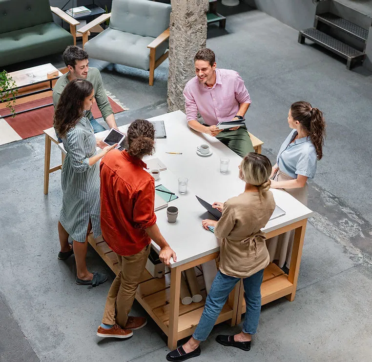 SnowGeek Solutions project team collaborating in a modern, open workspace