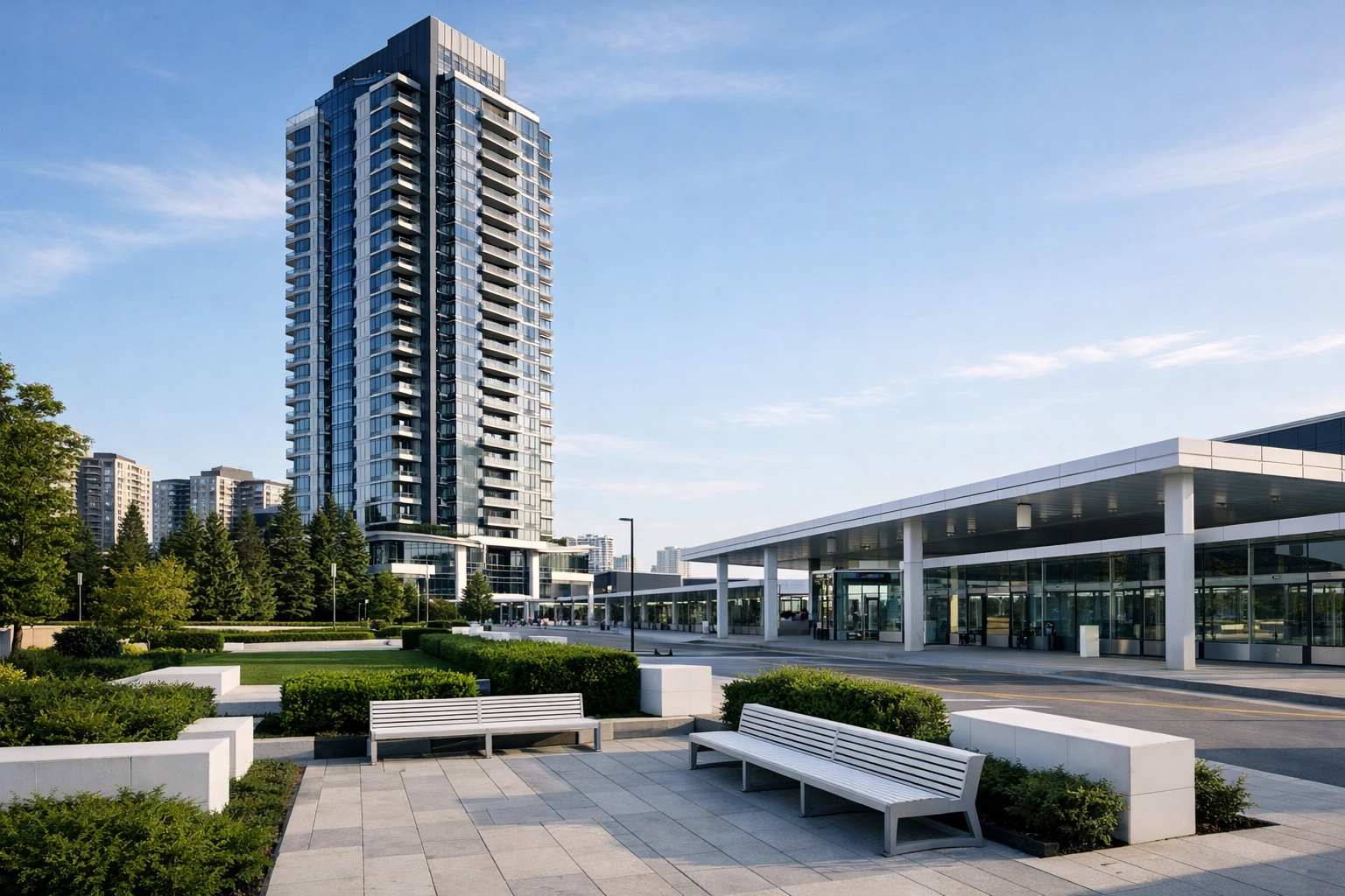 Modern glass condo tower and transit hub illustrating growth in the Mississauga real estate market.