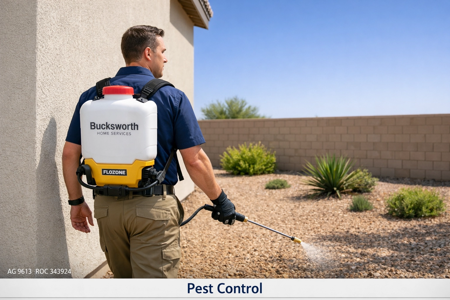 Bucksworth technician applying professional spider control treatment to the perimeter of an Avondale, AZ home.