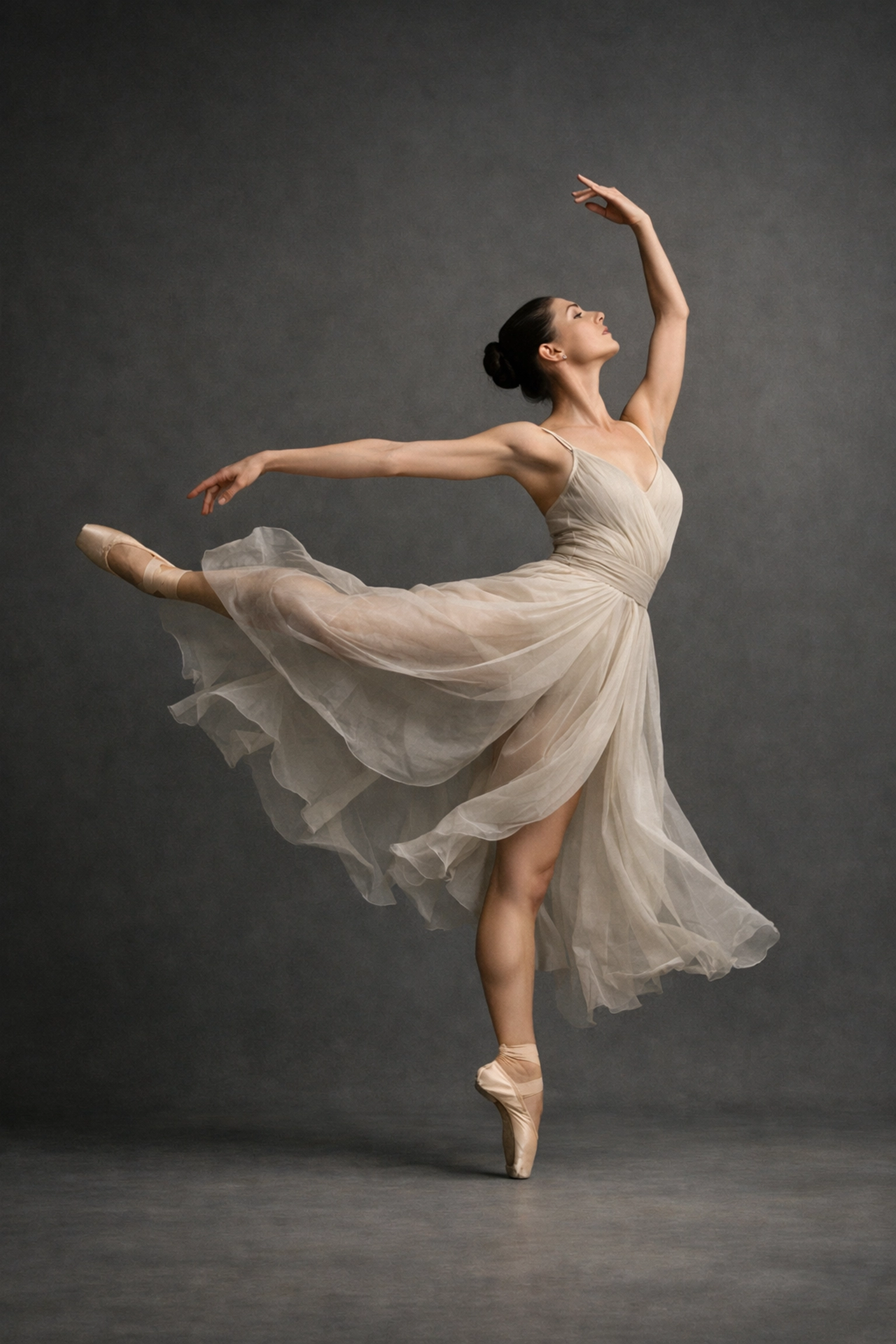 A creative fine art portrait of a dancer demonstrating elegant composition and balanced studio lighting.