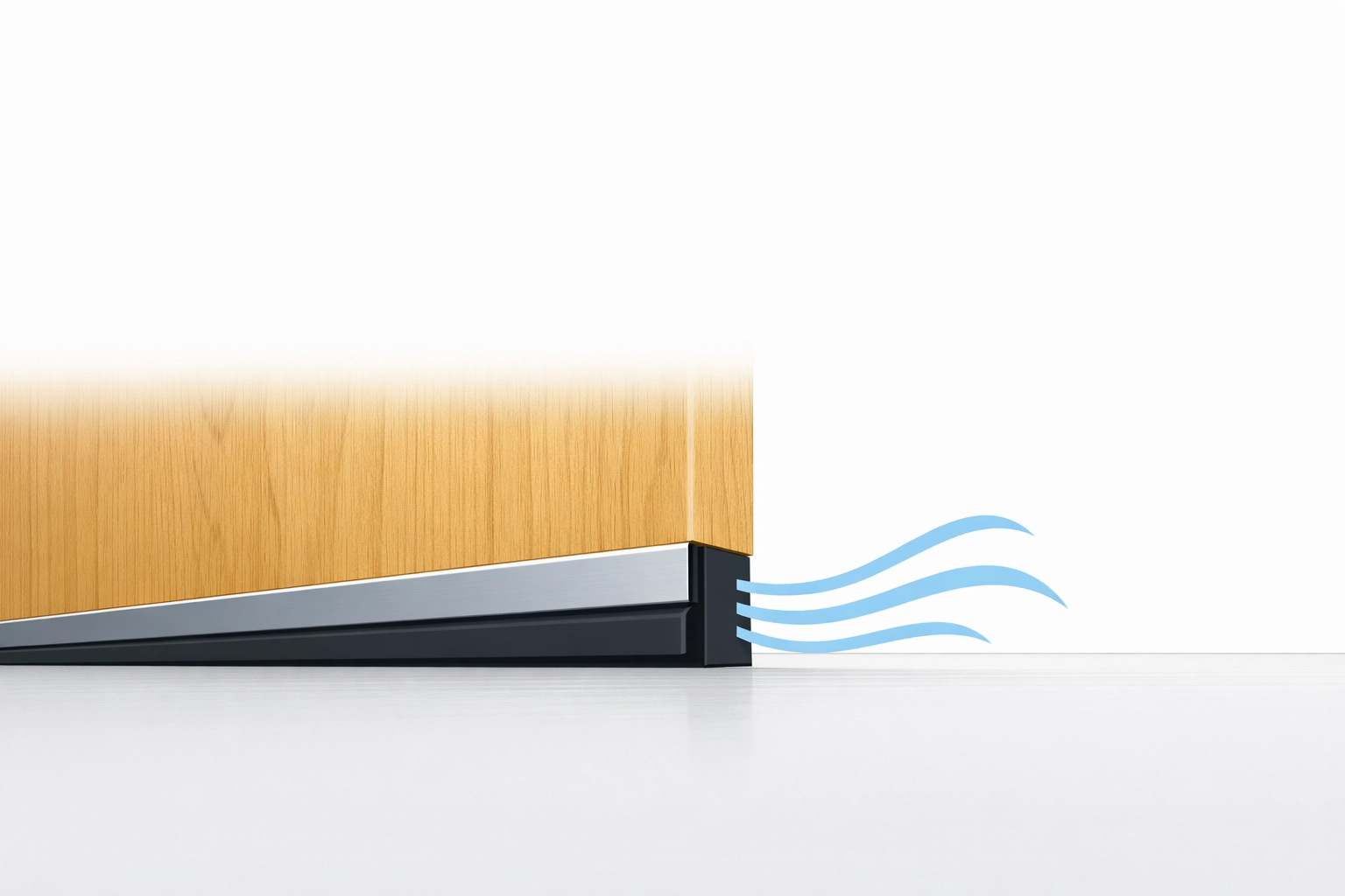 A door sweep sealing a gap to block cold drafts in a Vancouver home or condo.