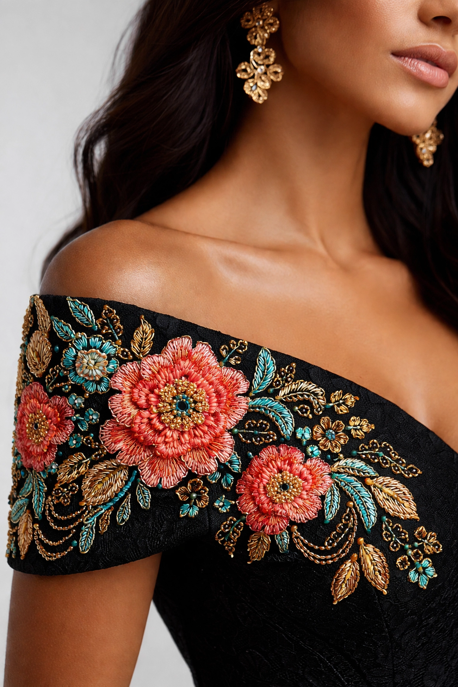 Close-up of artisanal embroidery on a Latina model, celebrating Latin heritage and contemporary couture.