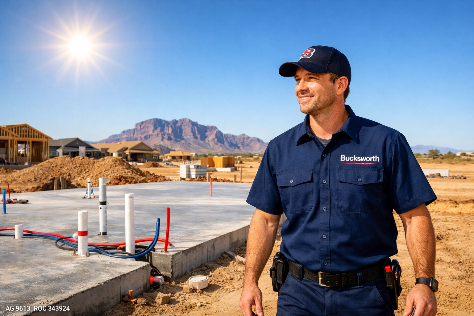 Bucksworth technician performing new construction plumbing rough-in at a Mesa Arizona residential job site.