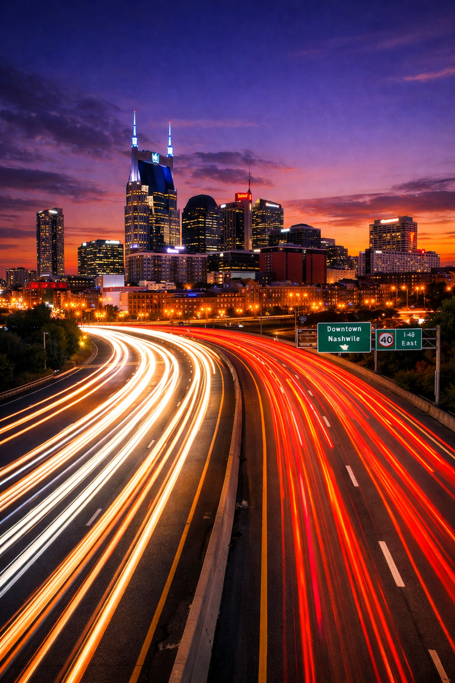 Nashville skyline and I-40 traffic at sunset, highlighting the current time in Music City.