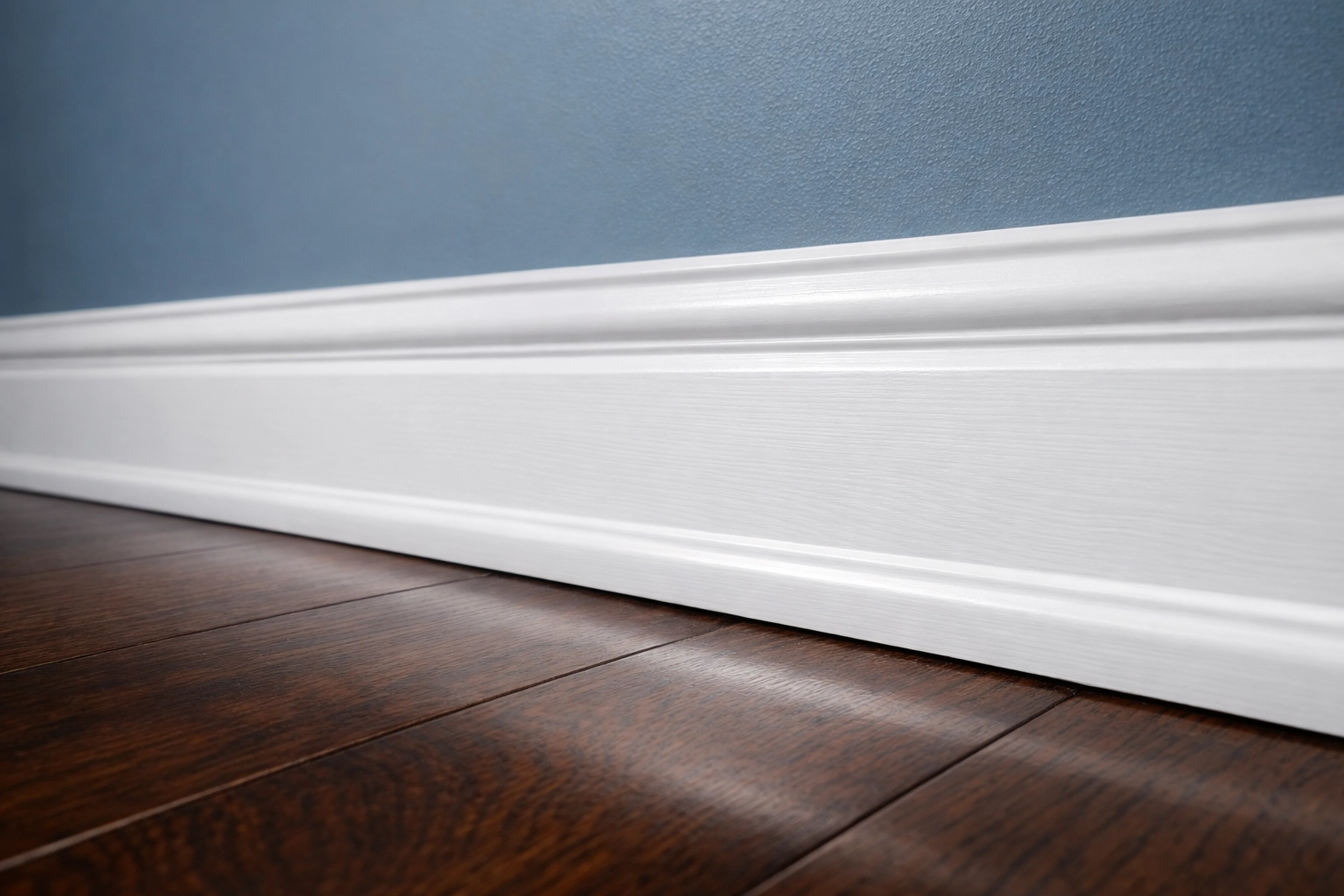 Pristine white baseboards and clean hardwood floors following a thorough deep cleaning in Westborough.