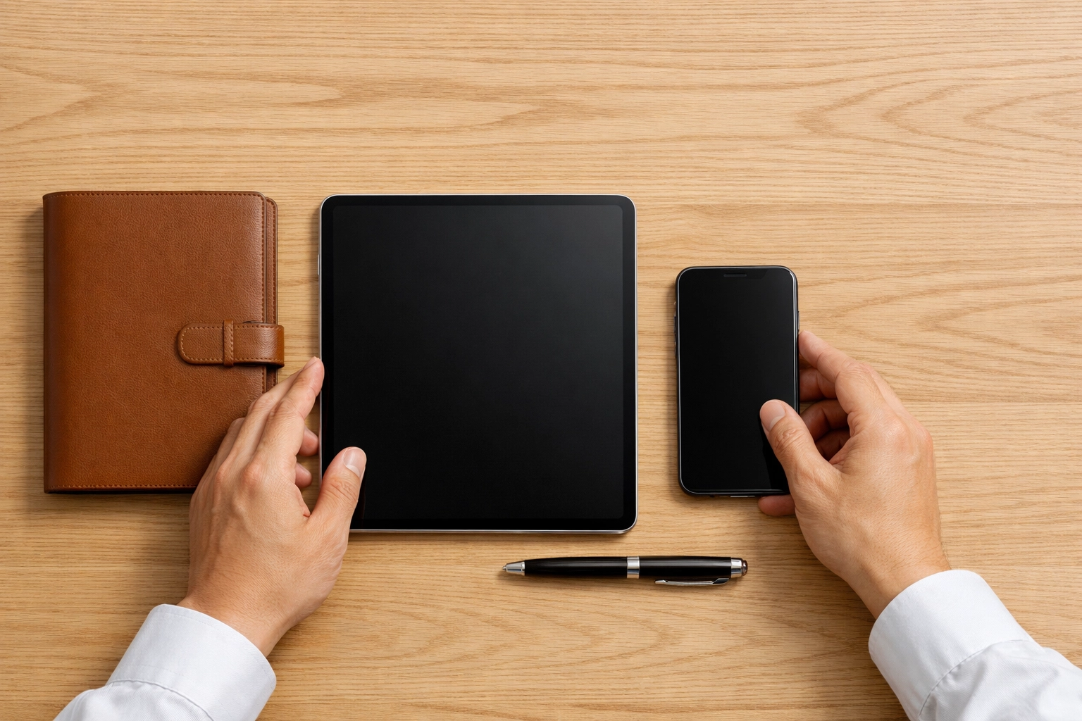 Organized business records and devices ready for 2026 IRS tax compliance and documentation.