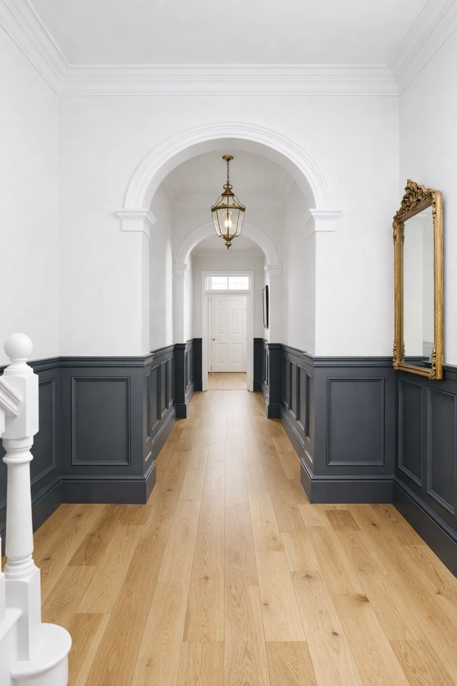 Classic charcoal grey and white two-tone wall panelling in a Cheltenham property hallway.