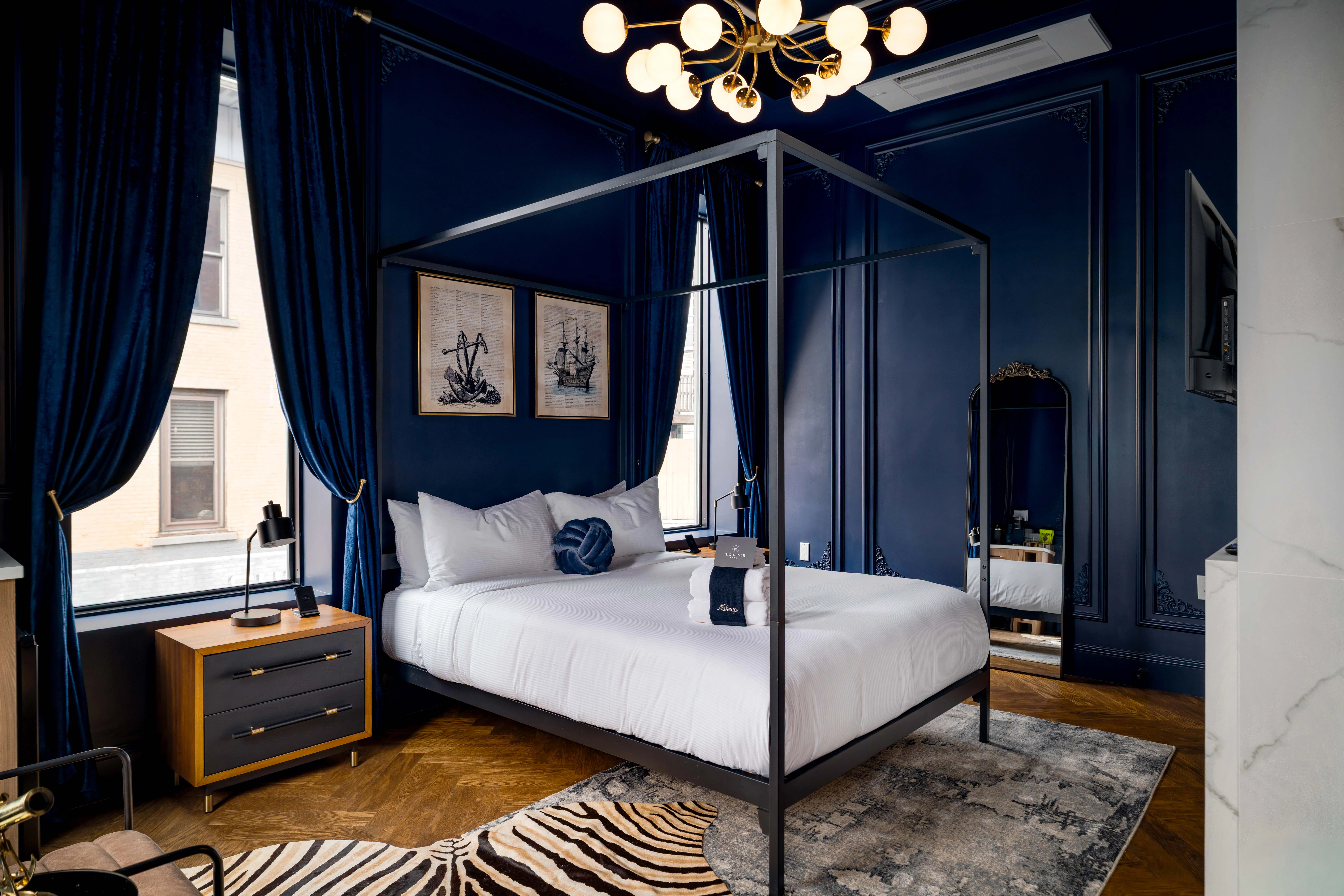 Four-poster bed in an elegant guest room, the kind of classic detail that makes unwinding feel effortless.