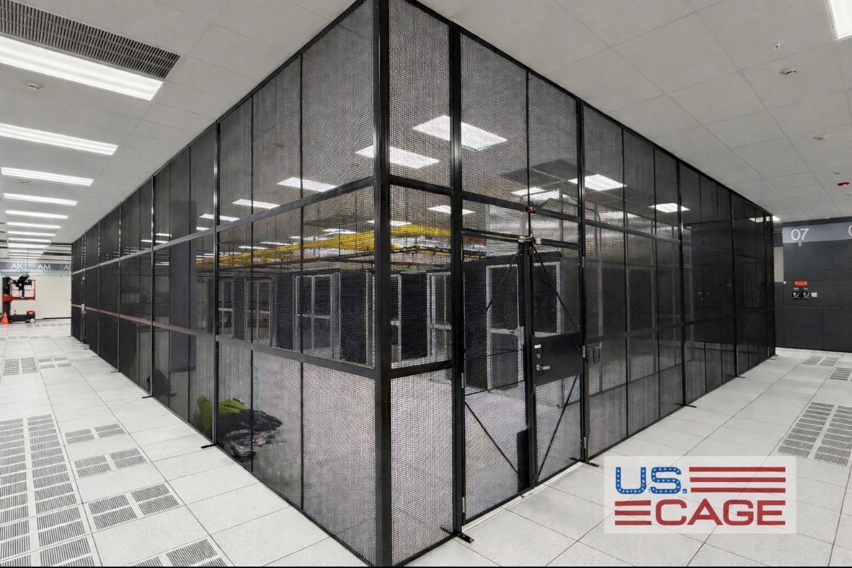 Large-format modular wire mesh security cage enclosing sensitive data center equipment.