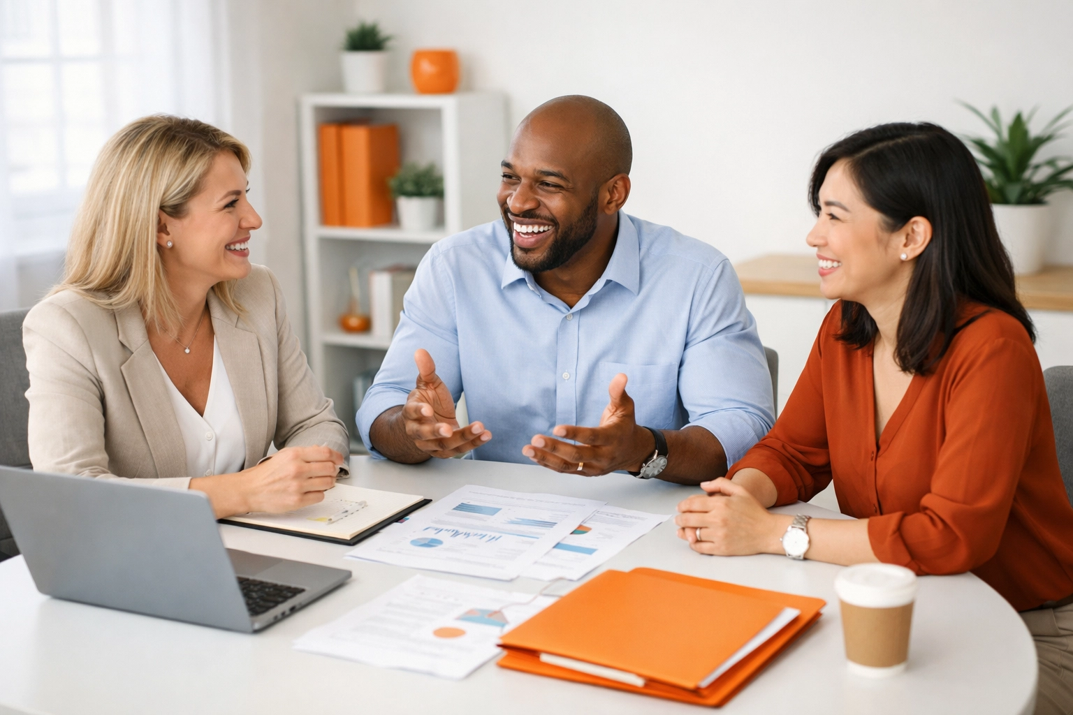 Insurance agent meeting with business owners to discuss commercial coverage options
