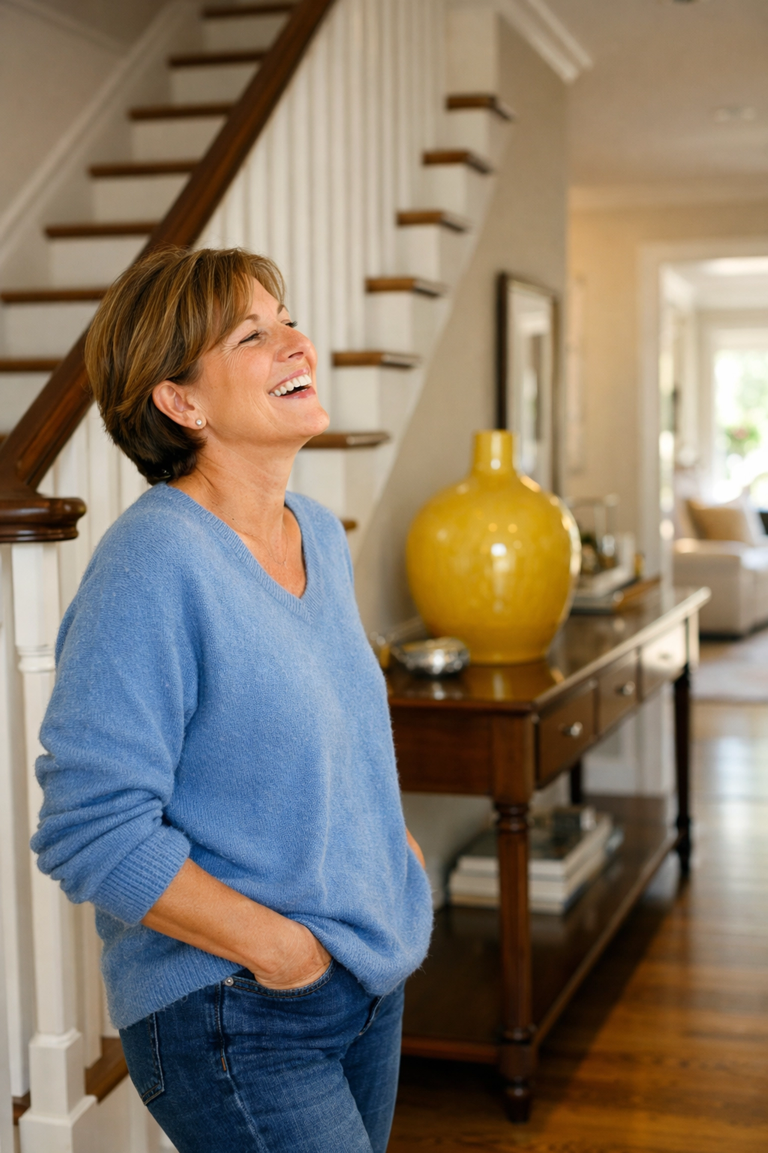 Happy Belmont homeowner enjoying a clean, stress-free home after premium residential cleaning services.