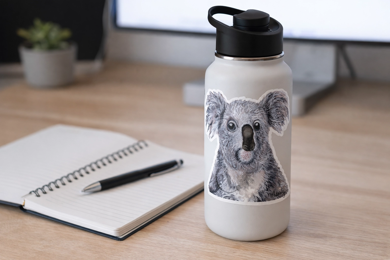Missy’s Koala sticker on a water bottle lifestyle mockup scene