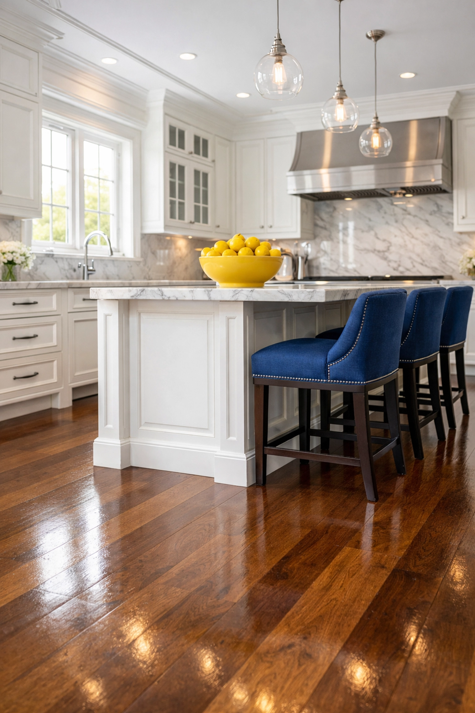 Spotless Winchester kitchen with marble countertops and clean hardwood floors, reflecting luxury cleaning standards.
