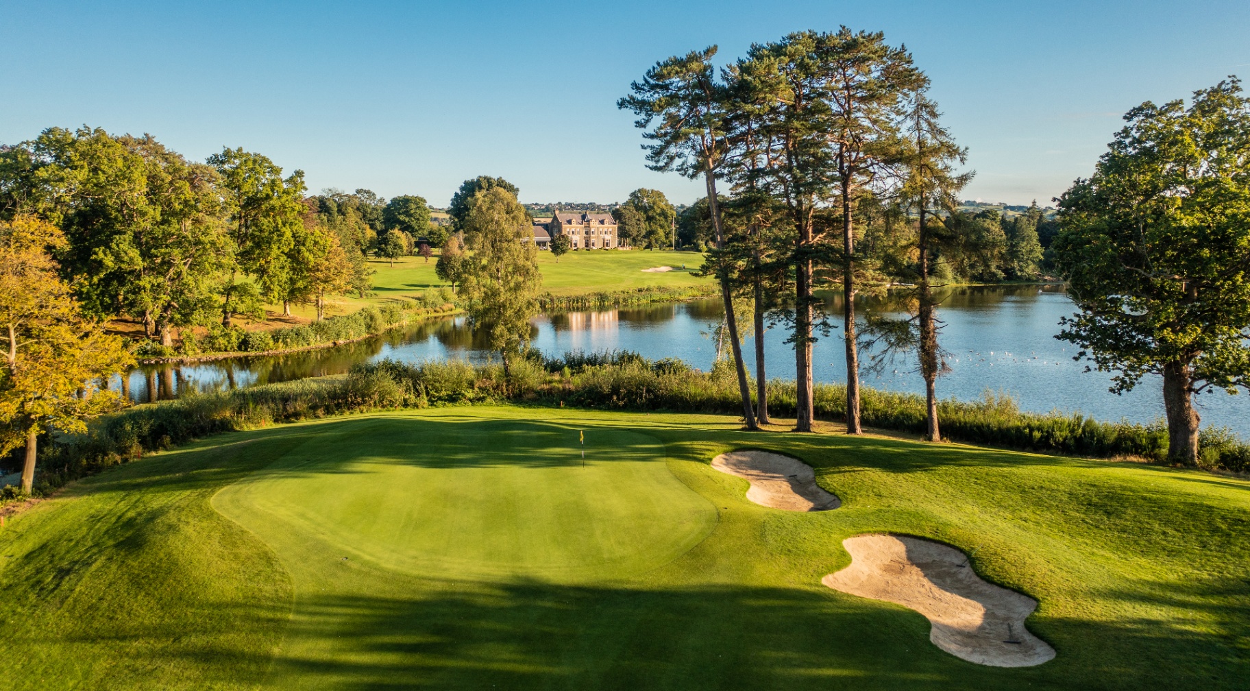 A scenic Northern Ireland parkland course with mature trees and pristine fairways