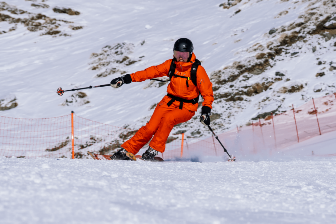 Skier in orange at Verbier
