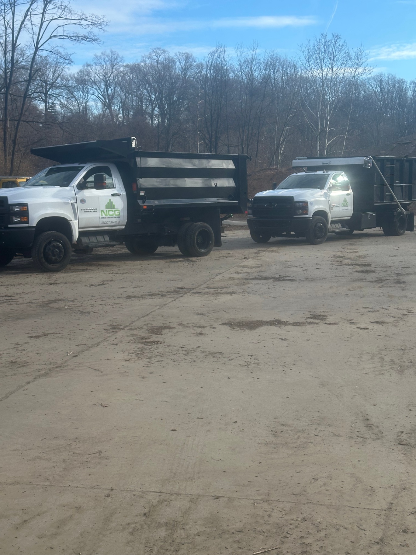 Narcise Construction Group Trucks at Job Site