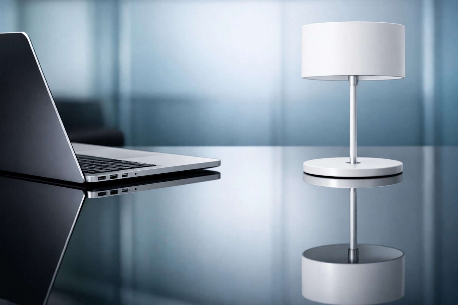 Clean executive desk with reflection, highlighting detailed office cleaning services for Grafton businesses.