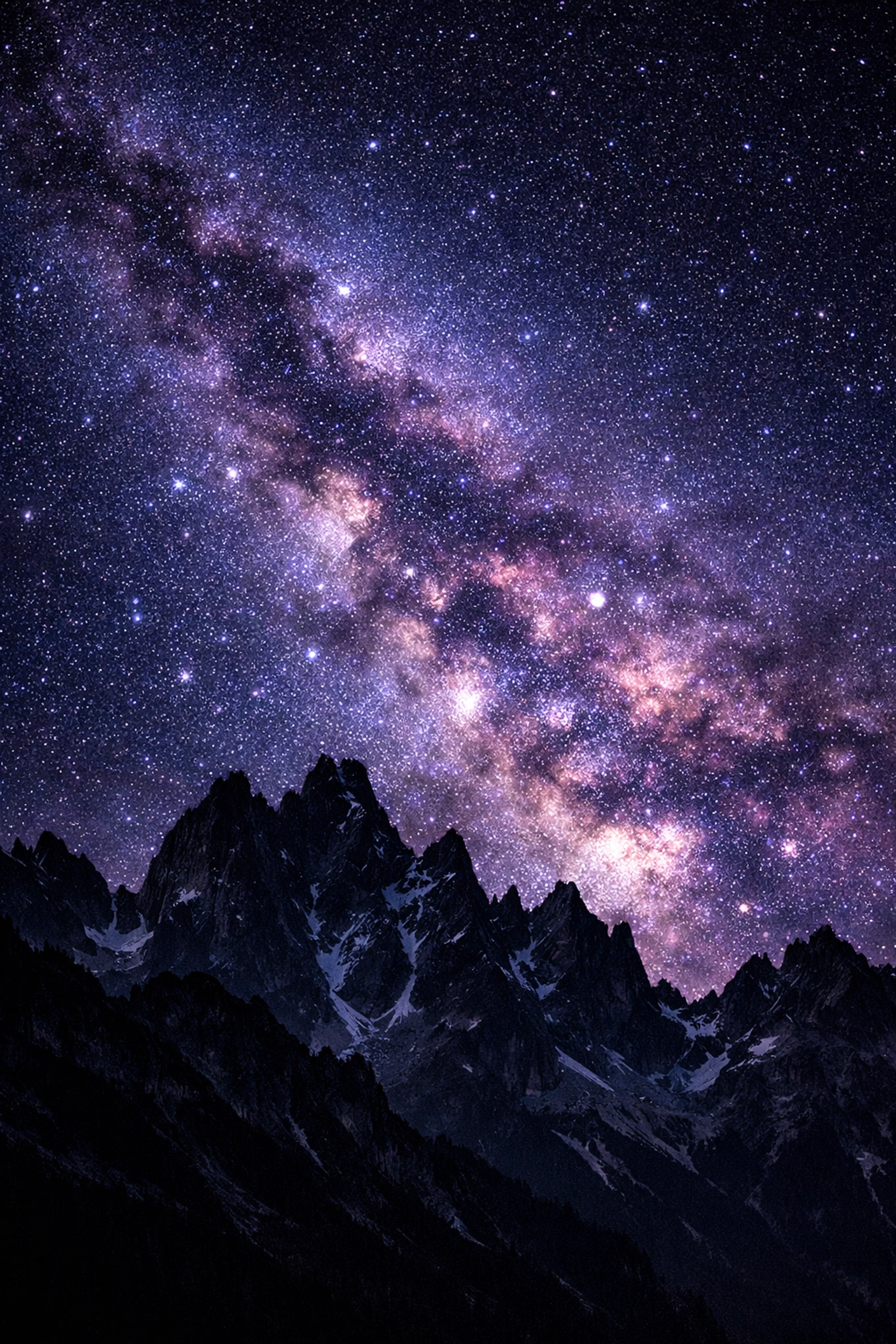 A dramatic night sky with the Milky Way galaxy over silhouetted mountains after a sky replacement edit.