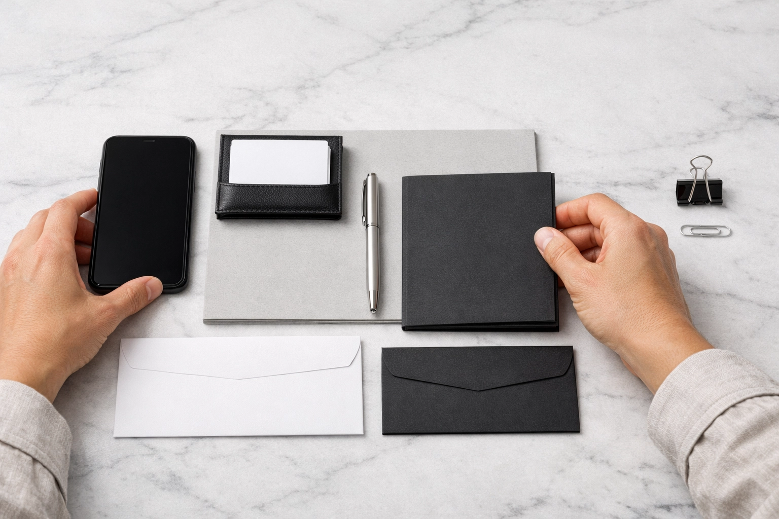 Professional hands organizing a workspace, representing structured business SOPs and CRM systems.