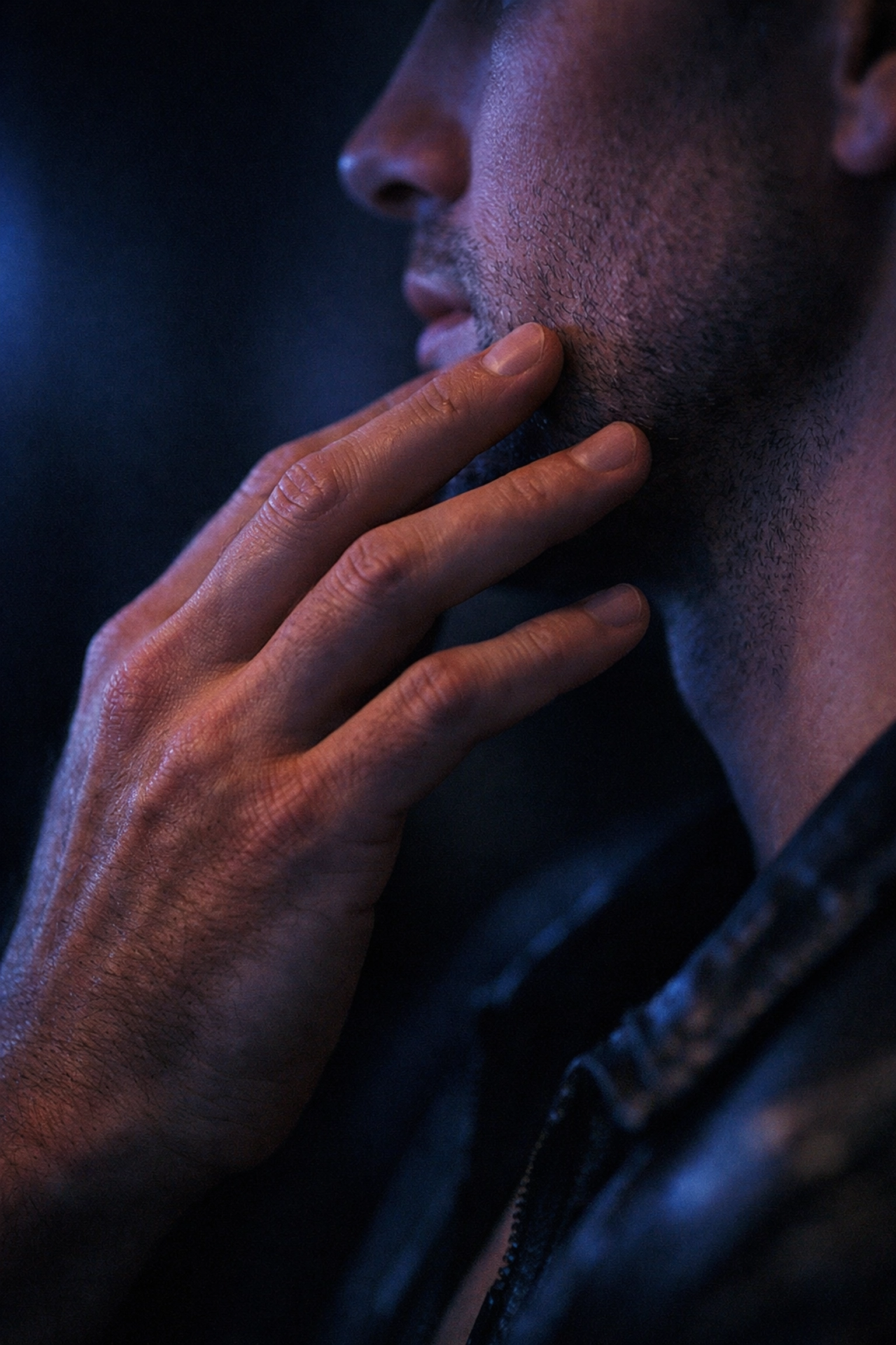 Close-up of an intimate first touch between two men, a central theme in many MM romance books.