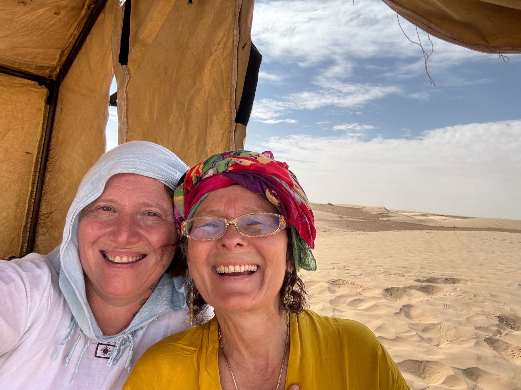 Two women under desert tent