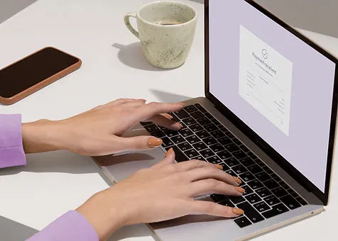 Real estate professional using Lofty CRM at a modern workstation