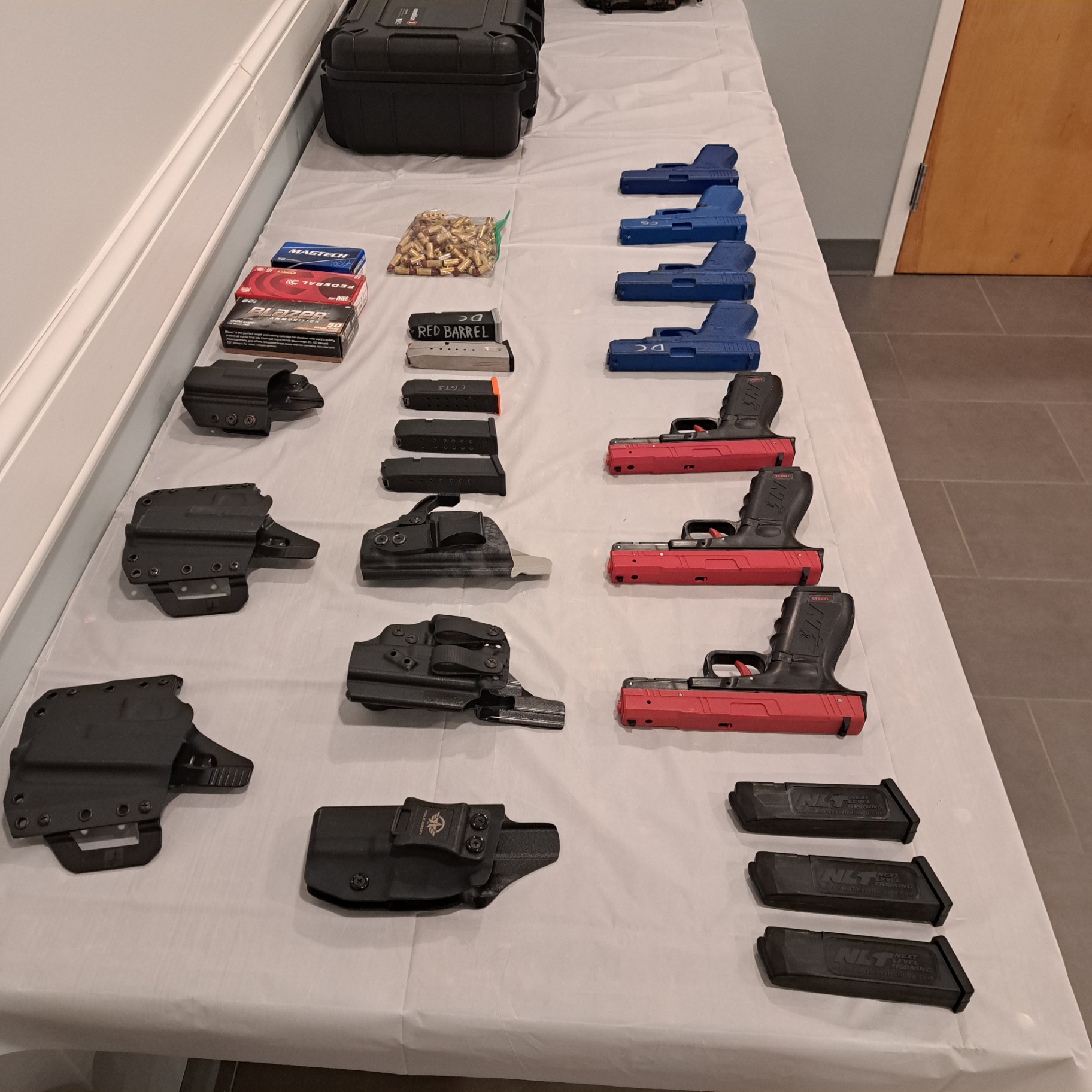 Setup includes holsters, training pistols, and inert training ammo used for NY State 18-hour Conceal Carry Courses
