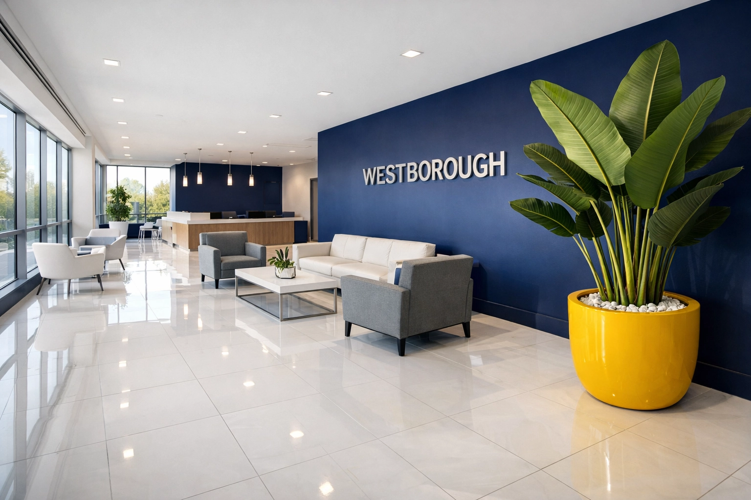 Pristine Westborough corporate lobby featuring gleaming white tile floors and modern professional decor.