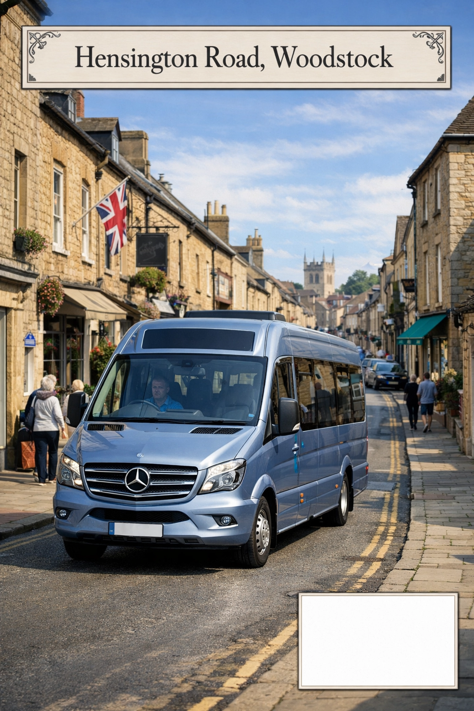 A tour minibus driving past traditional Cotswold stone buildings on a Woodstock street.