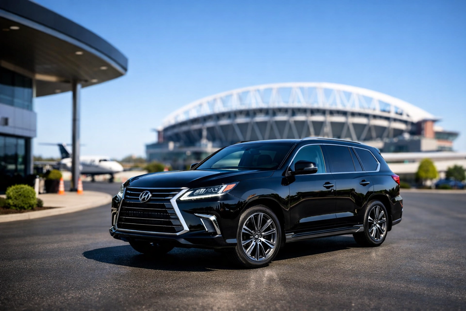 Luxury executive SUV at a private airport terminal for seamless Super Bowl corporate travel logistics.