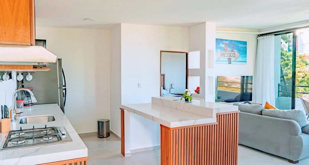 Modern Puerto Vallarta Condo Kitchen and Living Area