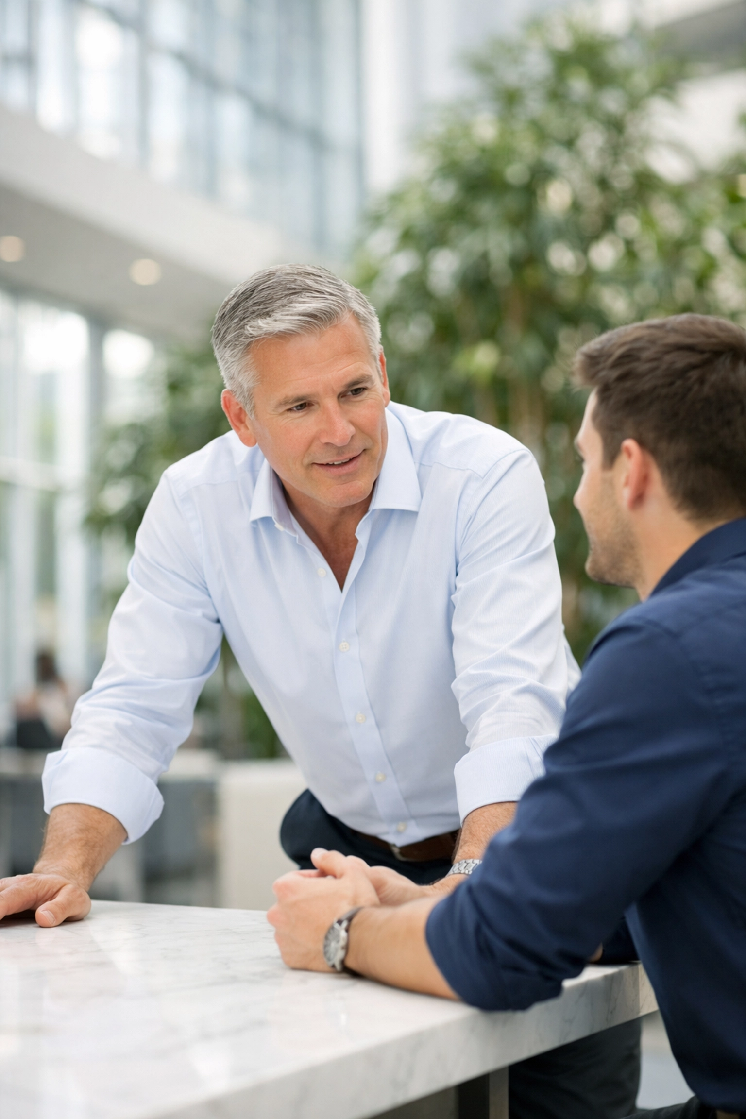Executive engaging in a one-on-one session as part of a leadership development program.