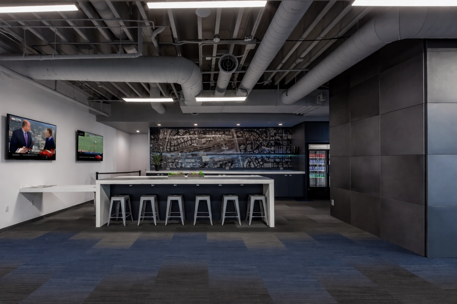 High-tech breakroom design in a corporate wellness room with public digital signage supporting an employee burnout solution