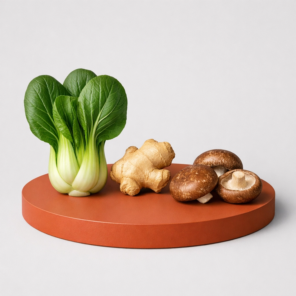 Fresh breakfast soup ingredients including baby bok choy, ginger, and shiitake mushrooms for meal prepping.