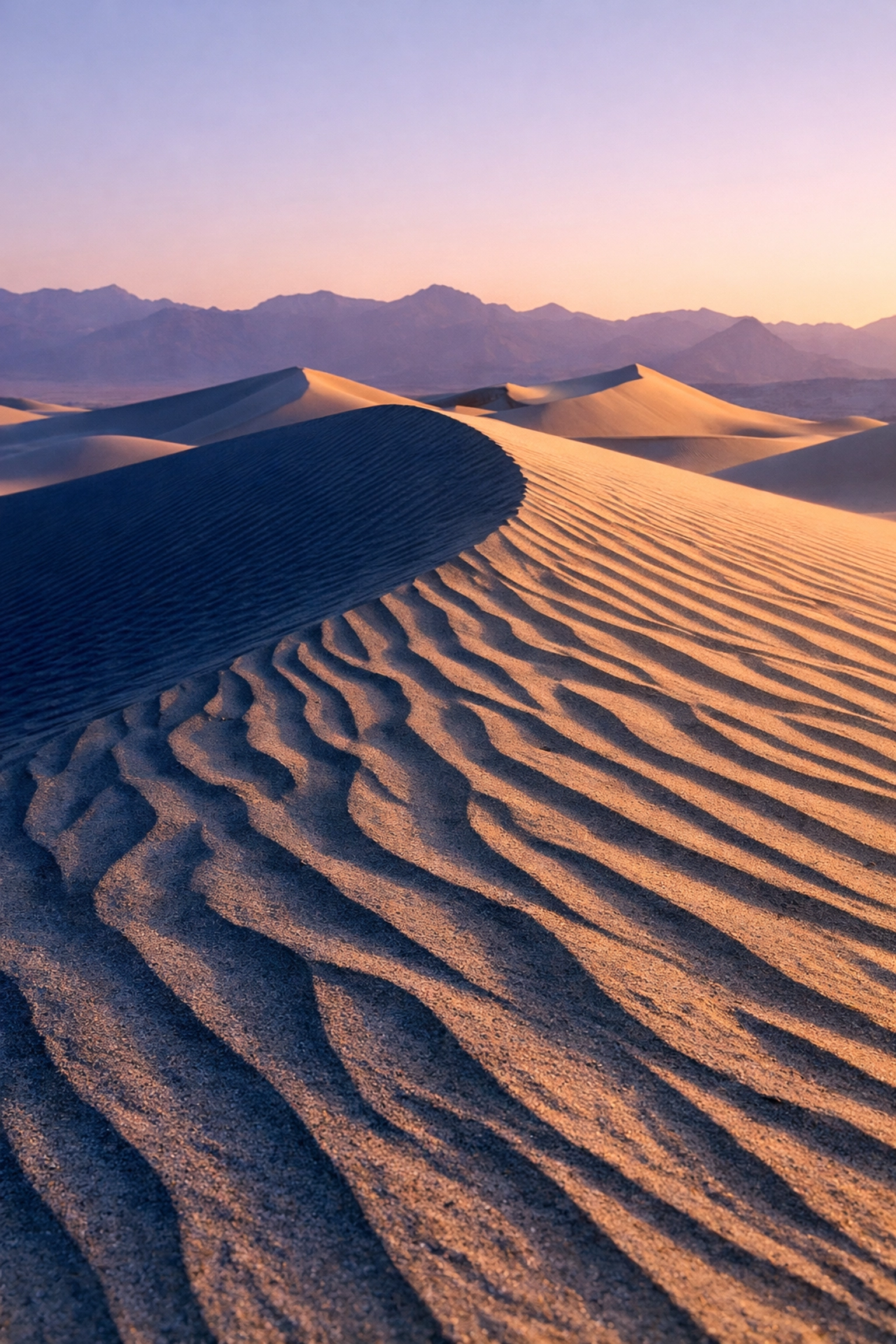 Sunrise at Mesquite Flat Sand Dunes, one of the most iconic landscape photography locations in Death Valley.
