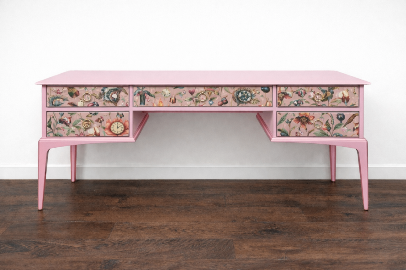 Whimsical pink botanical Stag-style desk/dressing table with floral detailing.