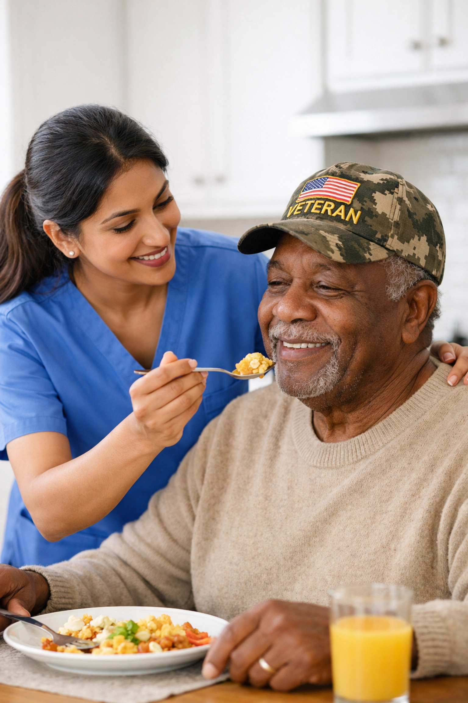 Compassionate home care assistant helping a veteran in Warrenton with daily living tasks in a modern kitchen.