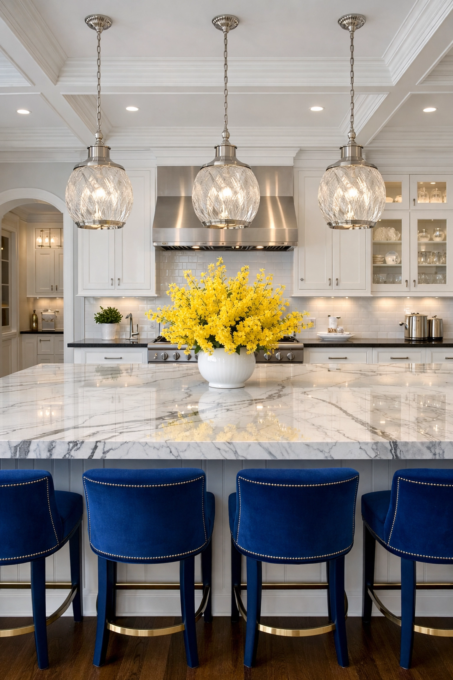 Immaculate high-end kitchen with polished marble island and professional residential cleaning in a Massachusetts estate.