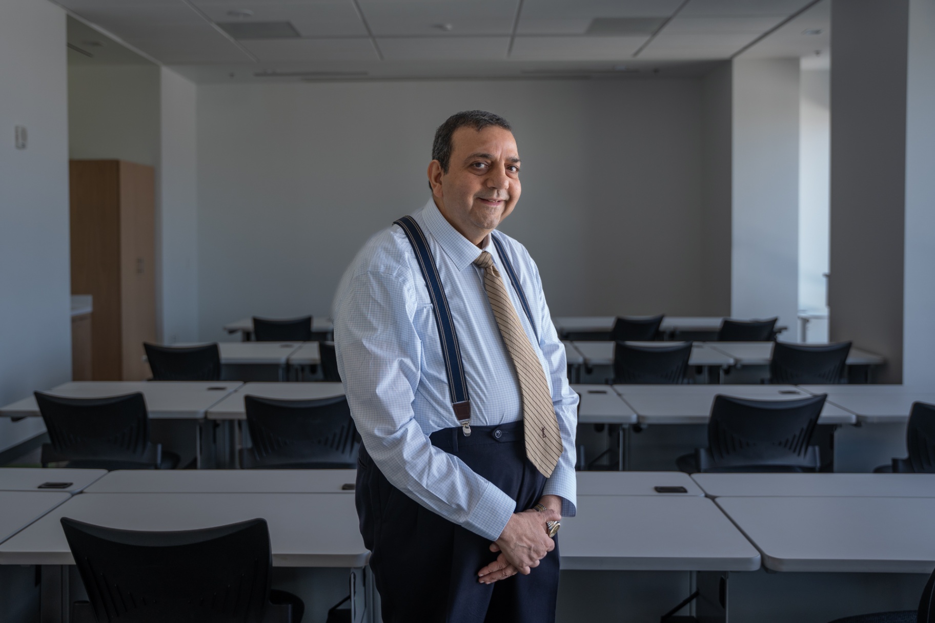Professionally Dressed Man in Corporate Training Room