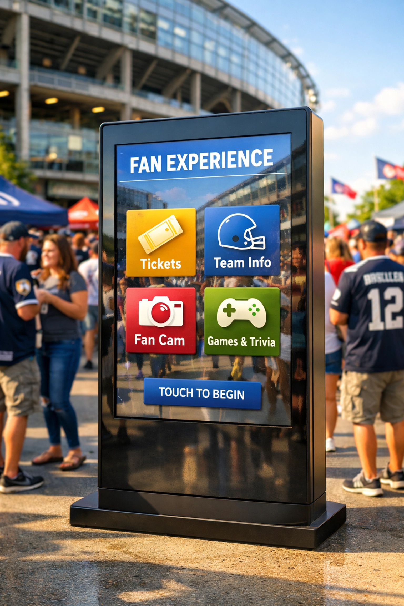 Fans interacting with a digital marketing kiosk at an outdoor stadium plaza during a sports event.